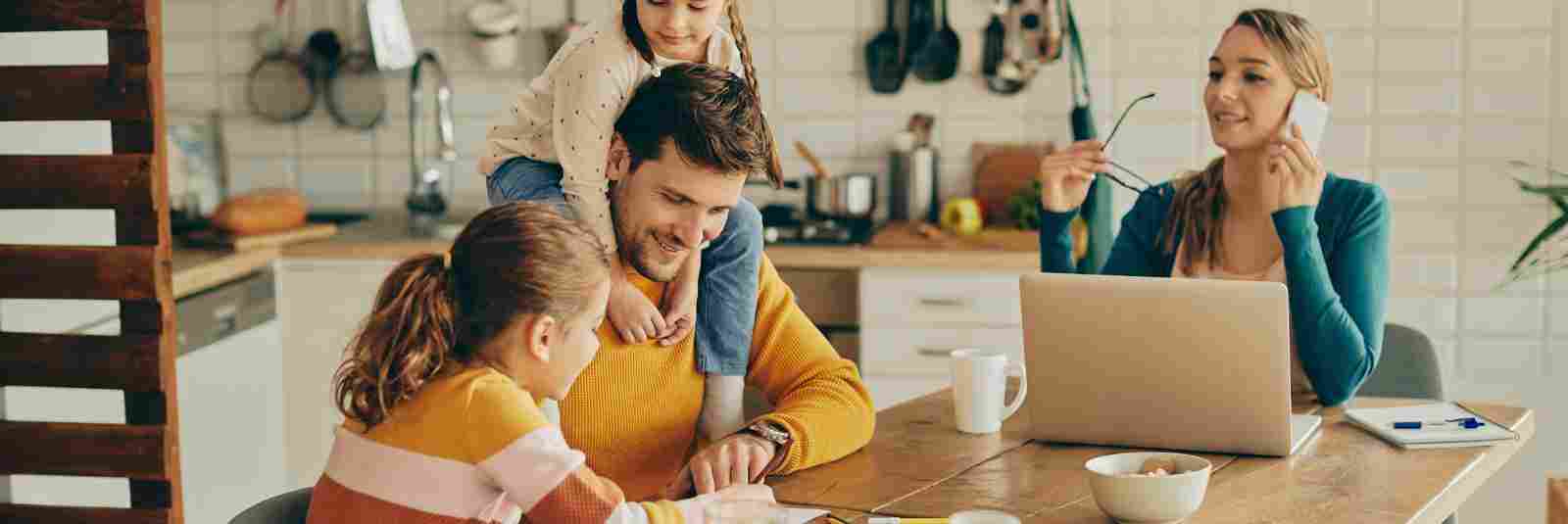 Family doing activities at Dining Room Table